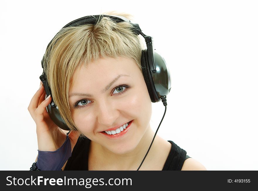 Woman in head phones on white background