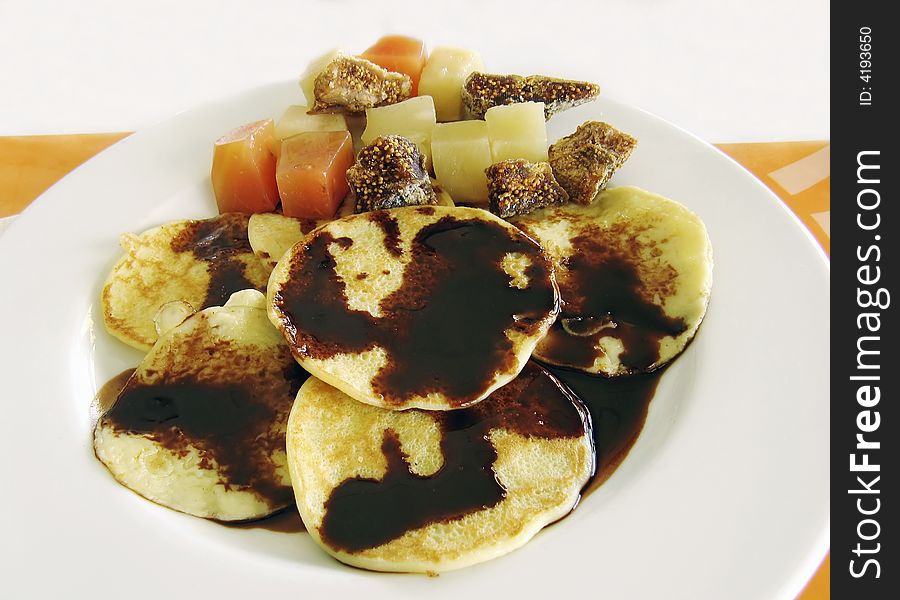 Food on plate - sweet pancake with chocolate and fruit