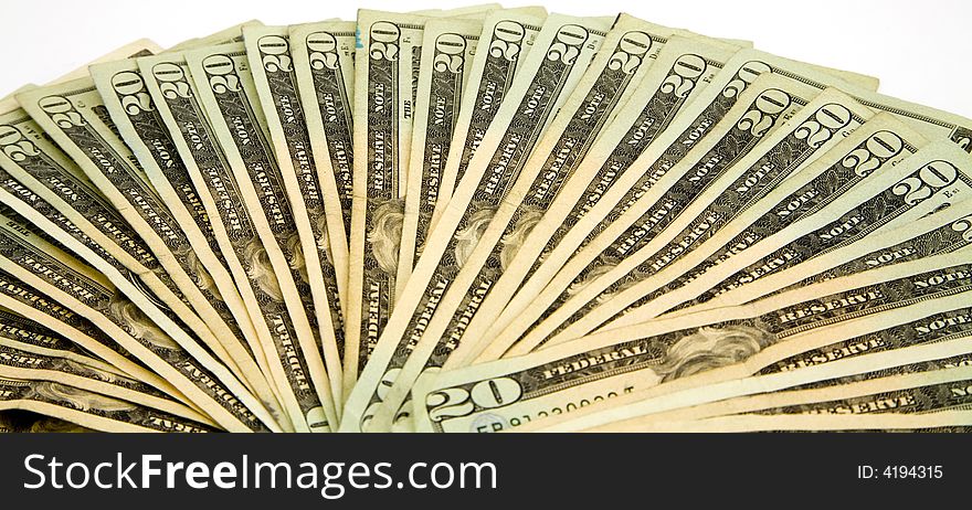 Fan of 20 dollar bills isolated on white background. Fan of 20 dollar bills isolated on white background.