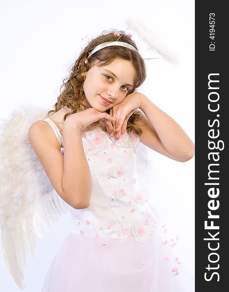 Young angel with white wings