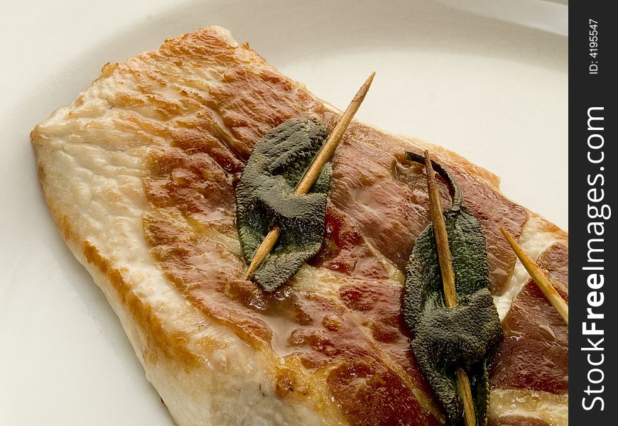 Italian calf cutlet with ham and sage leaves. Italian calf cutlet with ham and sage leaves