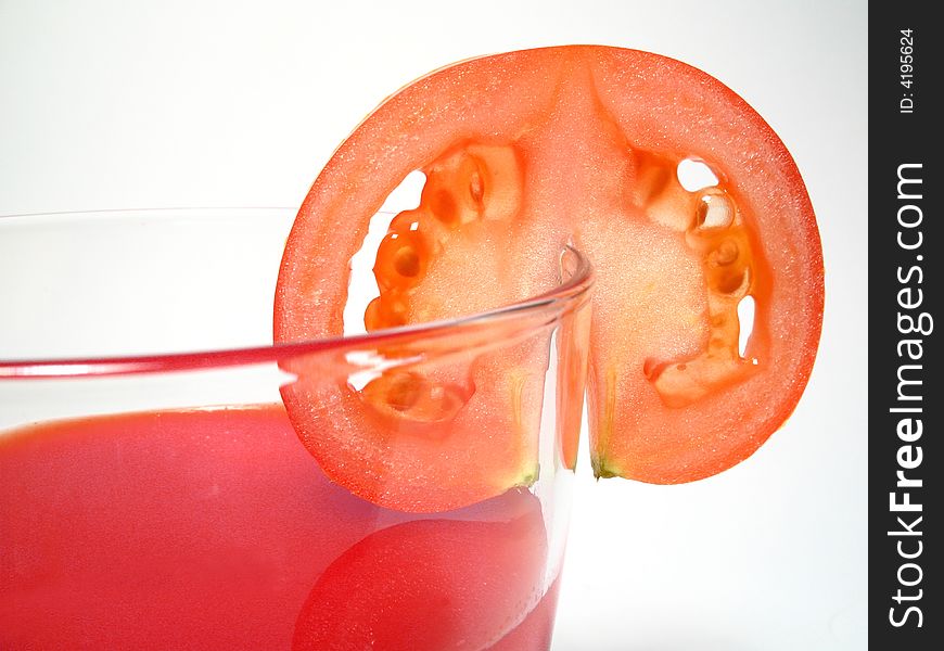 Still life with tomatos juice and tomatos