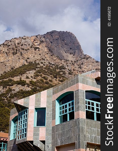 Building with mountain on background