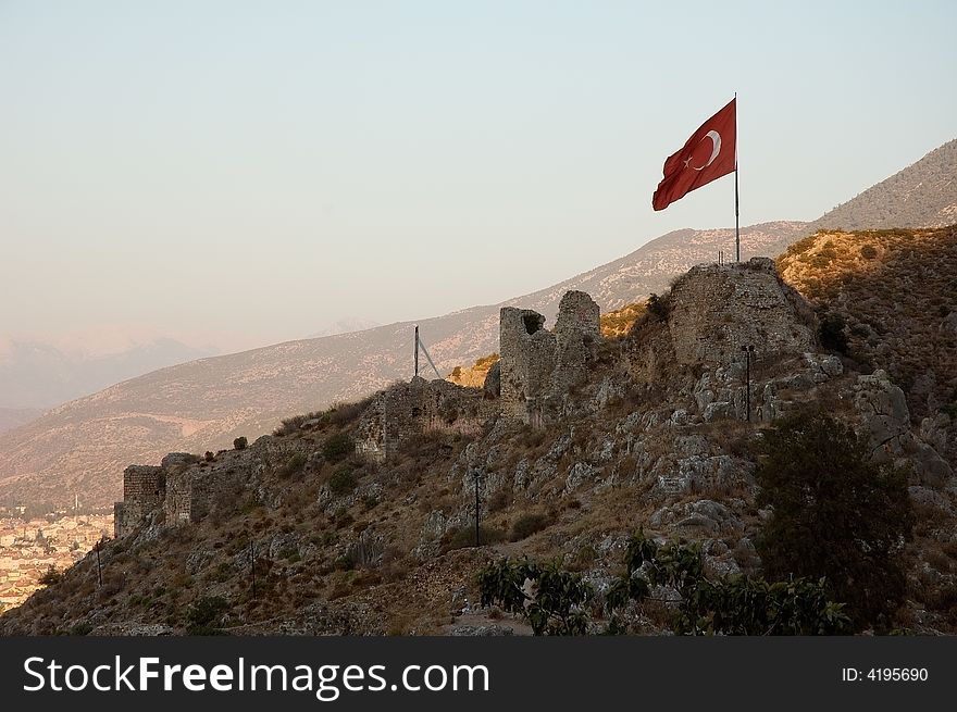 Turkish flag over mountain