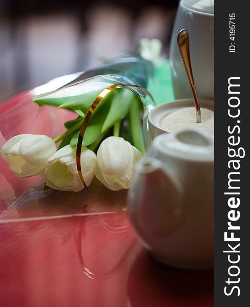 White tulips on a coffee table. White tulips on a coffee table