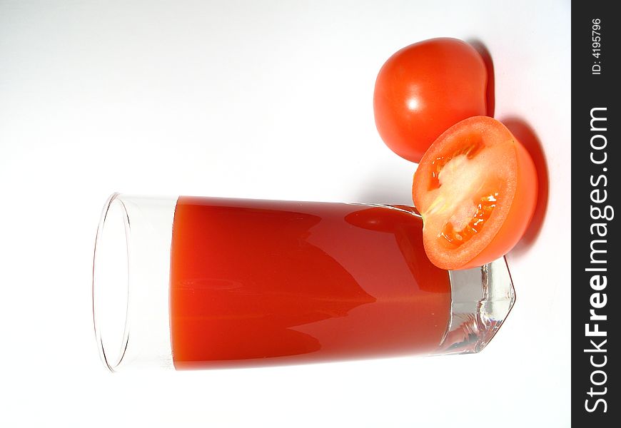 Still life with tomatos juice and tomatos
