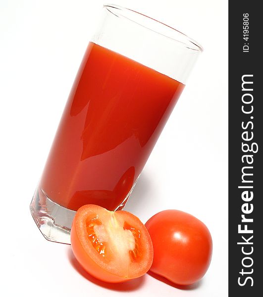 Still life with tomatos juice and tomatos