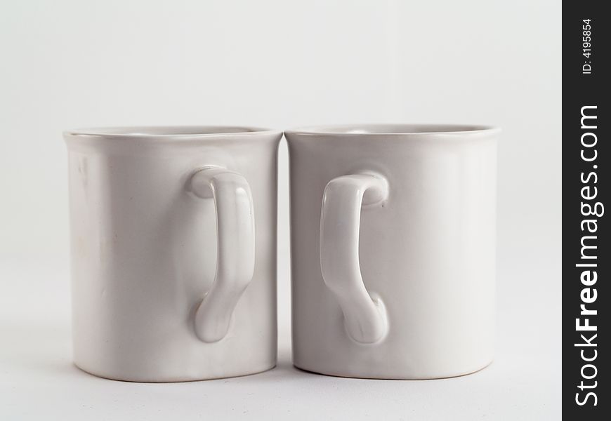 Two white mugs (cups) on white background