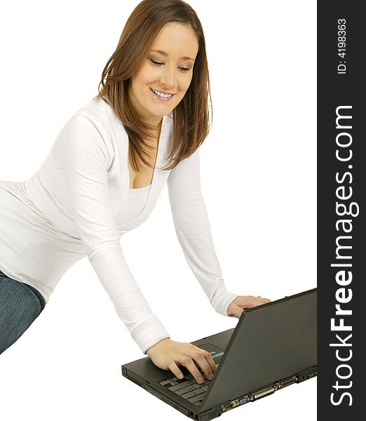 Close up caucasian girl using laptop with happy expression. Close up caucasian girl using laptop with happy expression