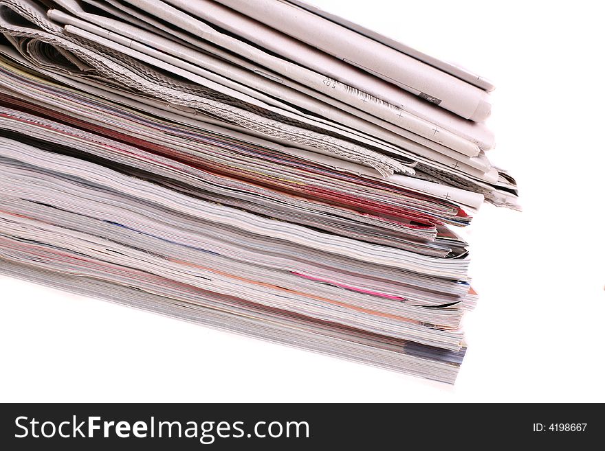 Stack of newspapers isolated on white. Stack of newspapers isolated on white