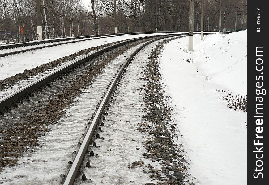 Turn on the right; the railway leaving afar under a bias. Turn on the right; the railway leaving afar under a bias