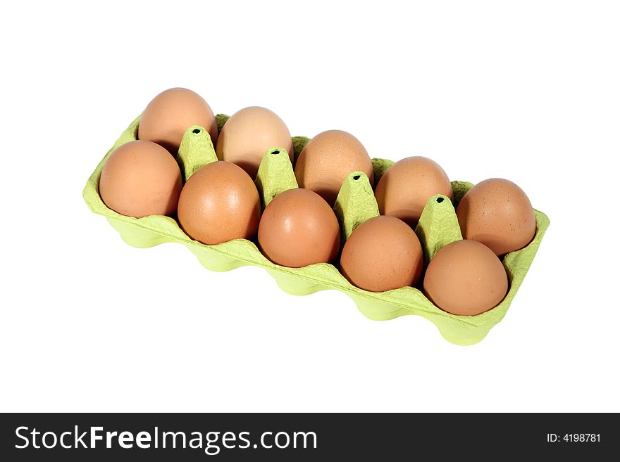 ten eggs in a box against white background