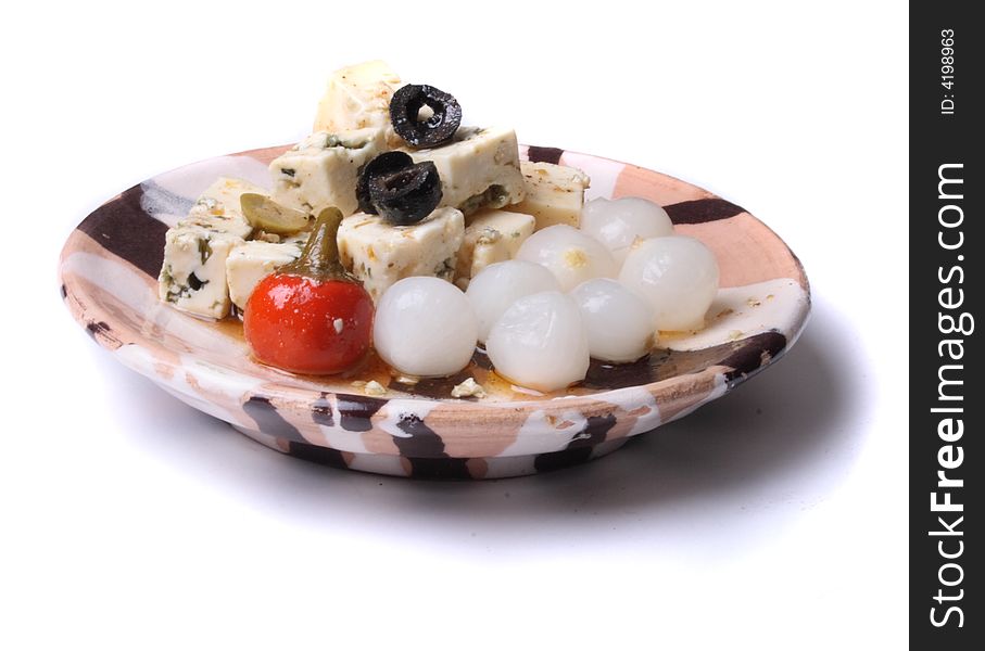 Cheese, onion and olives on the white background. Cheese, onion and olives on the white background