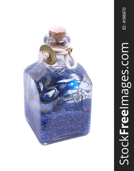 Bottle with blue oil on the white background. Bottle with blue oil on the white background