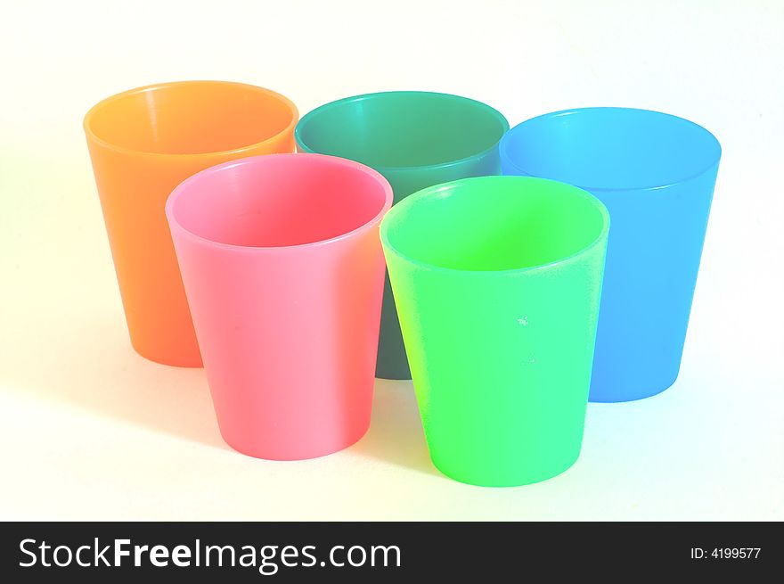 Group of plastic coloured tumblers. Group of plastic coloured tumblers