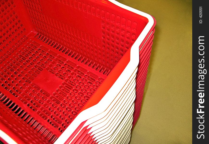 Angle shot of a pile of shopping baskets. Angle shot of a pile of shopping baskets