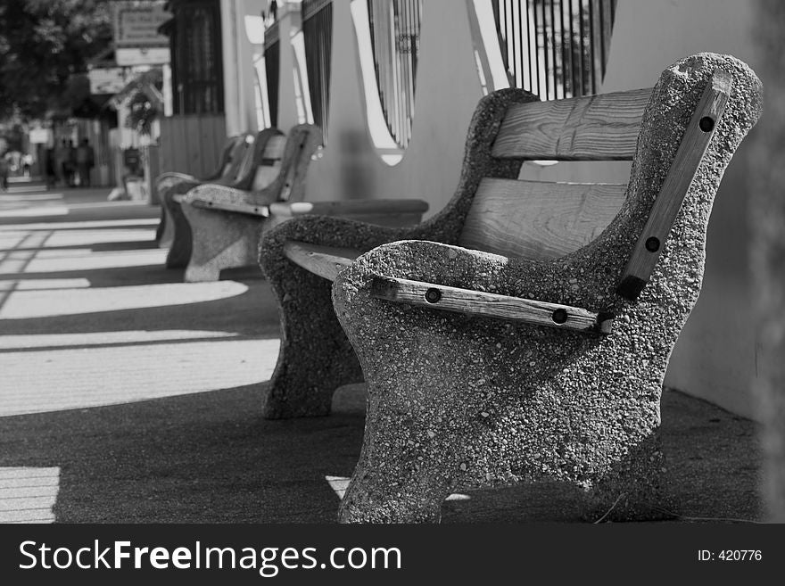 Picture of a row of park benches. Picture of a row of park benches