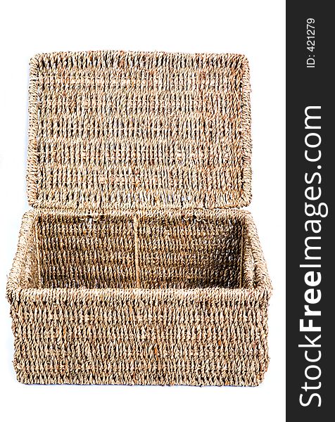 A wicker box - open. A wicker box - open