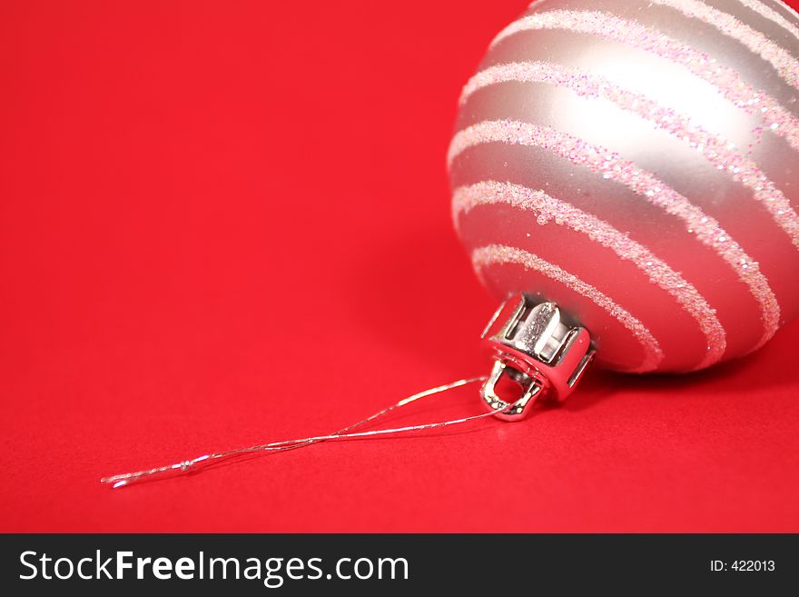 Christmas ball with red background. Christmas ball with red background