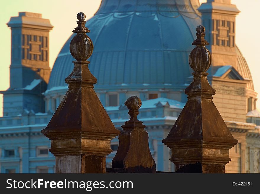 Some roof top decorations set against a domed roof in old Montreal. Some roof top decorations set against a domed roof in old Montreal