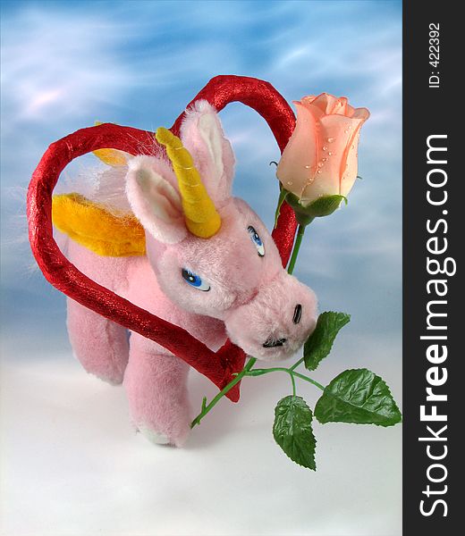 Pink unicorn with red heart and rose. Pink unicorn with red heart and rose.