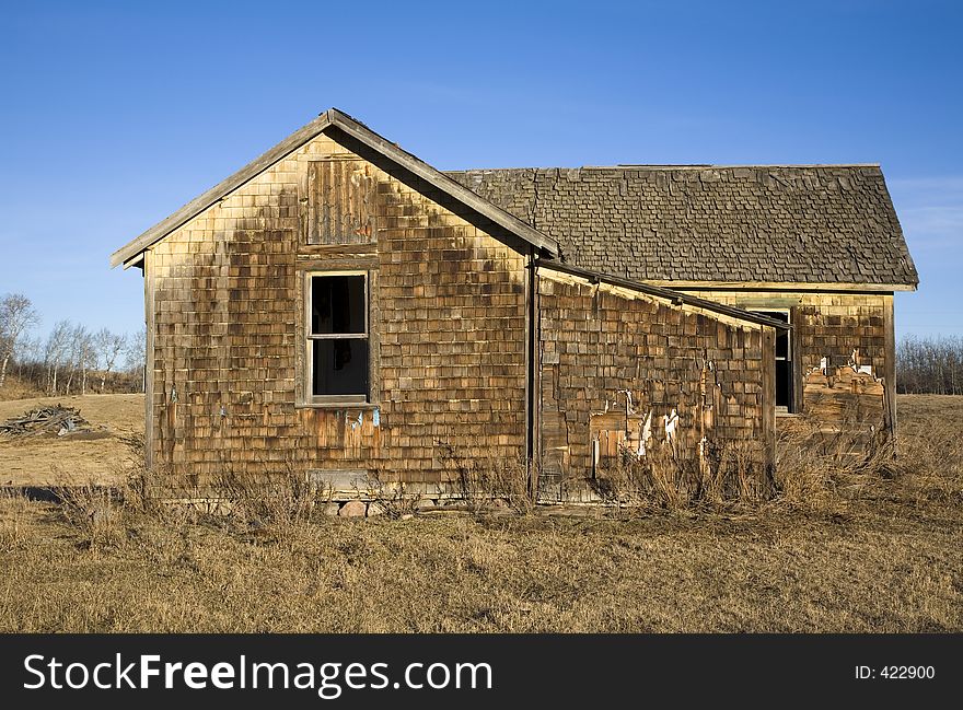 An abandoned farmhouse. An abandoned farmhouse