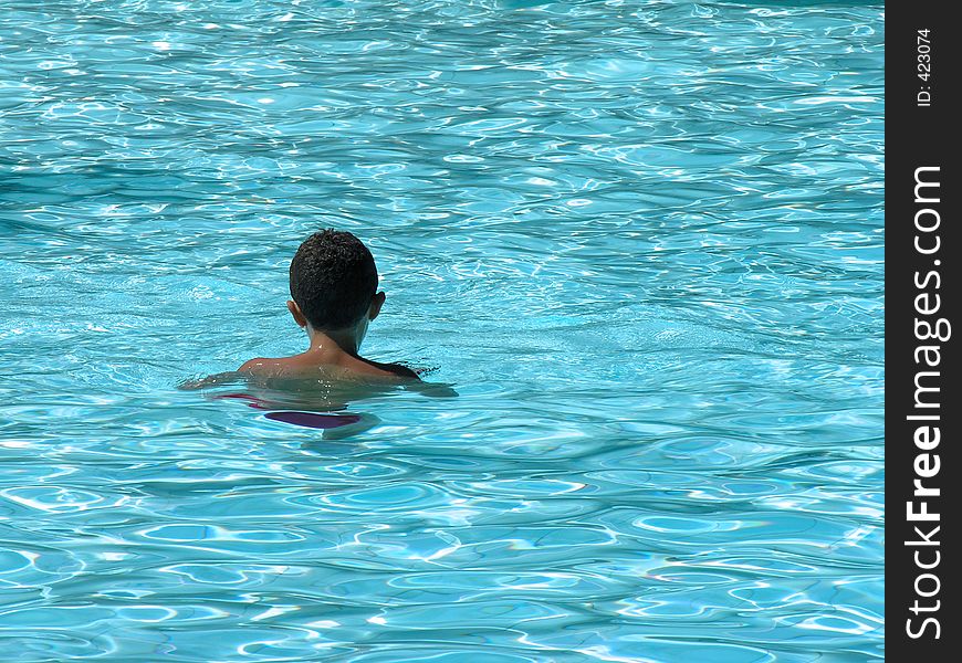 Boy in swimming pool. Boy in swimming pool