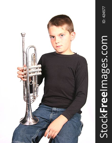 Child Holding Trumpet