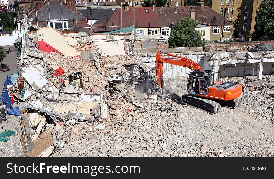 Digger on Demolition Site. Digger on Demolition Site