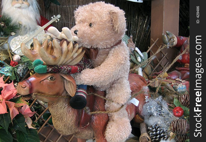 Christmas decoration of bear riding on reindeer. Christmas decoration of bear riding on reindeer