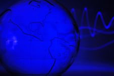 Blue Glass Globe & Wave Stock Photography