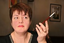 Woman With Cigarette In Mouthpiece Stock Photography Woman With Cigarette In Mouthpiece Stock Photography