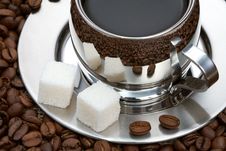 Cup Of Coffee With Lump Sugar And Beans Royalty Free Stock Photos
