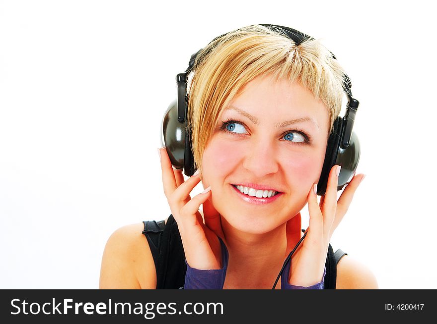 Woman in head phones on white