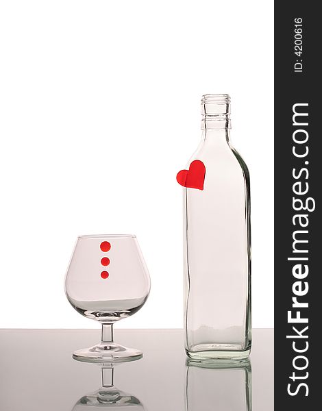 Bottle with heart and glass with drop. Bottle with heart and glass with drop