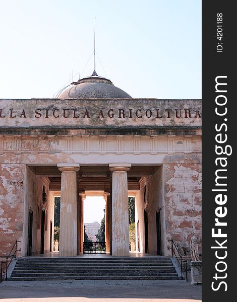 Ancient patrician villa in Palermo. Villa Bordonaro entrance columns and facade. Sicily. Italy. Ancient patrician villa in Palermo. Villa Bordonaro entrance columns and facade. Sicily. Italy