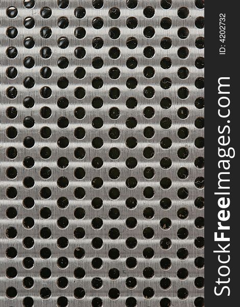 Metal background with circle holes