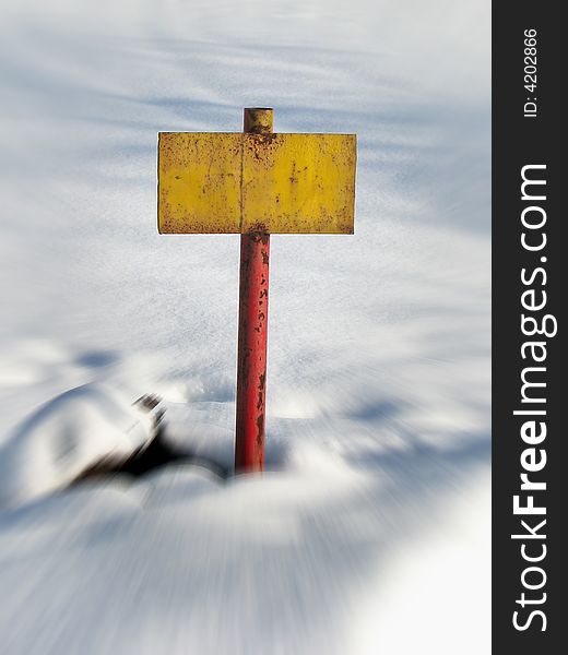 Old yellow rusty tablet on blured snow background. Old yellow rusty tablet on blured snow background