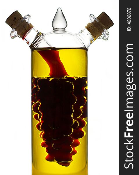 Sauce-bottle on white background with yellow and red liquids