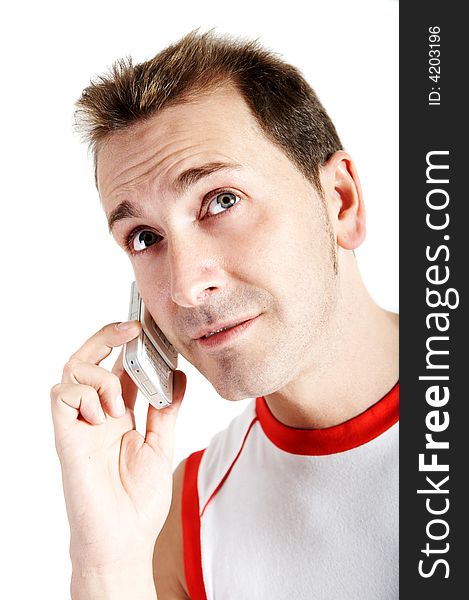 Casual man speaking with a cell phone. Casual man speaking with a cell phone