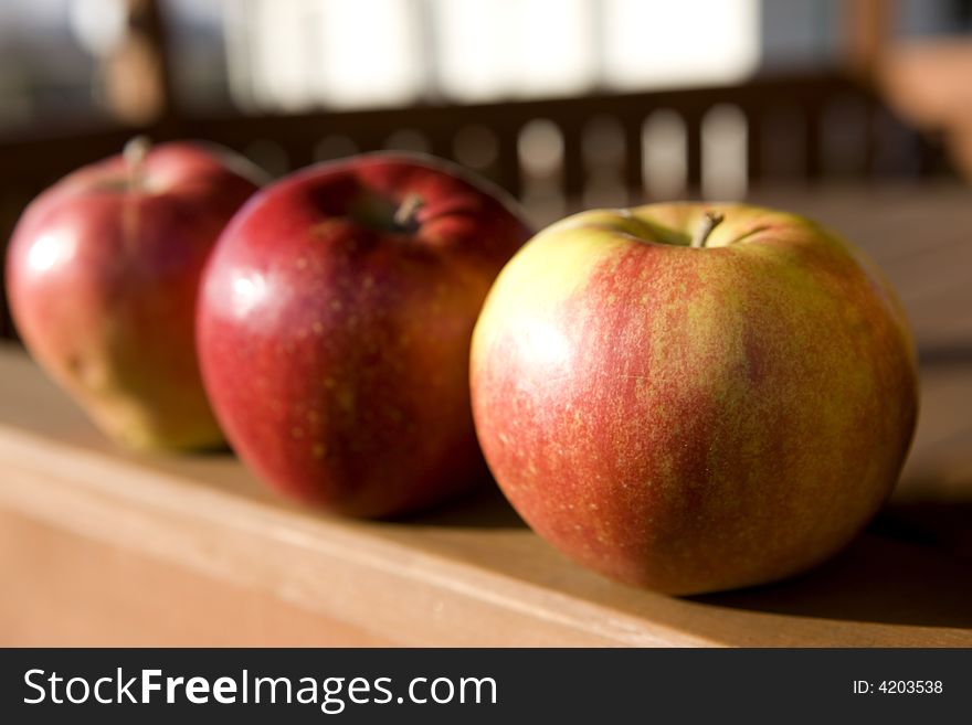 Three apple on the garden