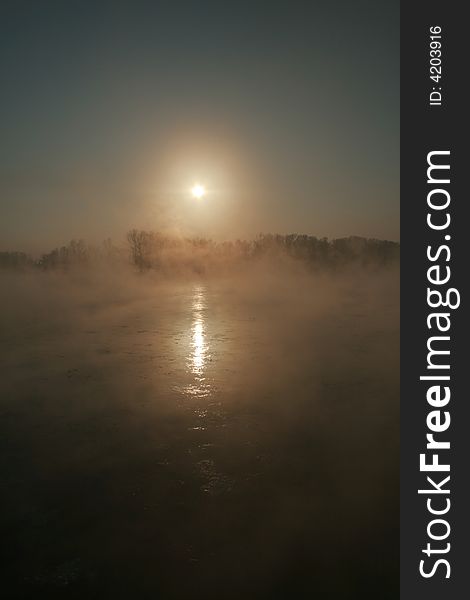 Ice on the river and fog. Please see some similar pictures from my portfolio: