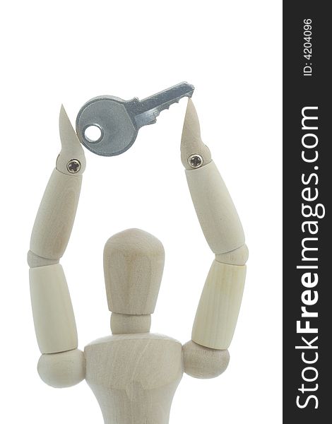 Manikin holds key in hands high up. Manikin holds key in hands high up