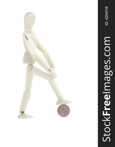 Isolated Manikin Standing On A Coin