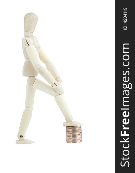 Manikin Standing On Coin Pile