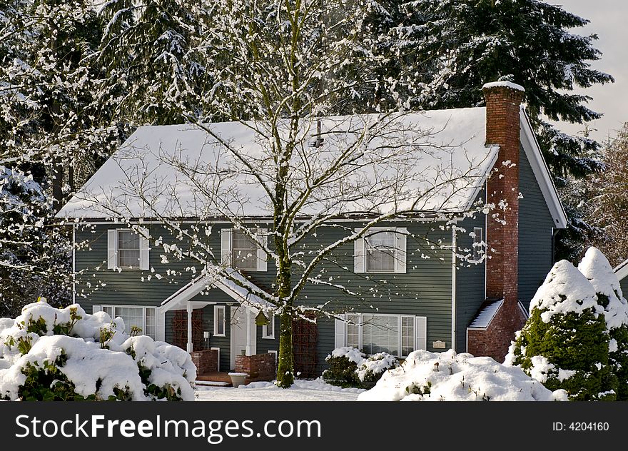 A private home on acreage covered in snow. A private home on acreage covered in snow