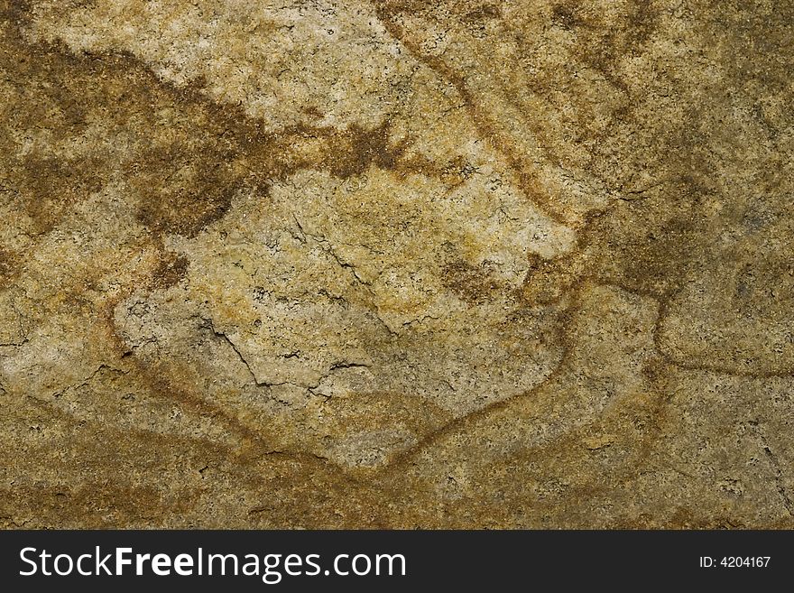 An old natural stone texture with cracks. An old natural stone texture with cracks
