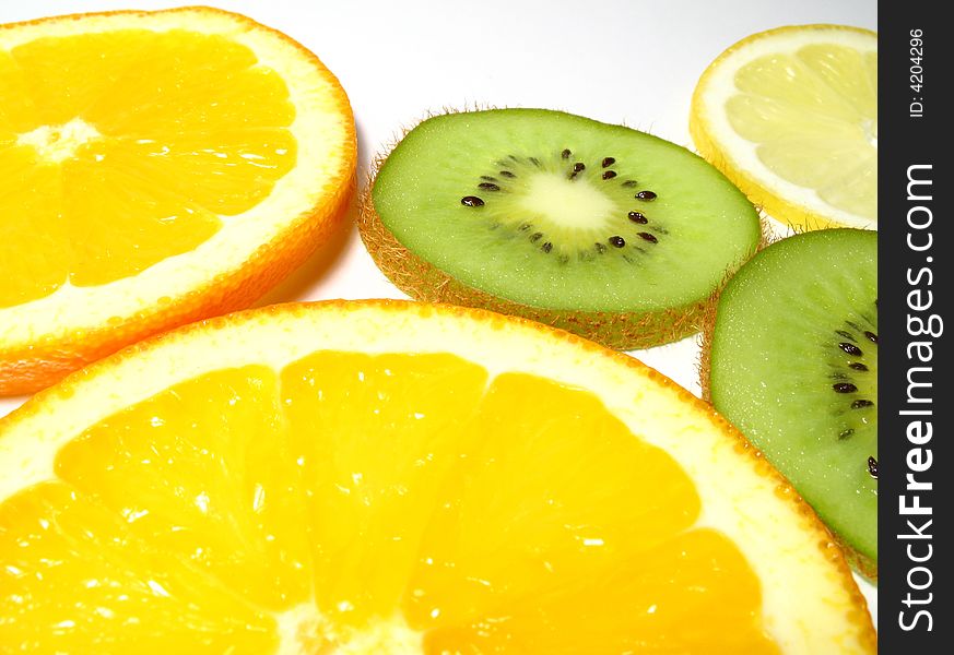 Sliced kiwis, lemon and orange