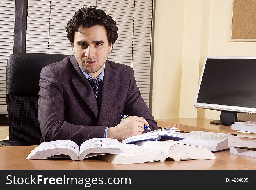 Business man at office at his desk