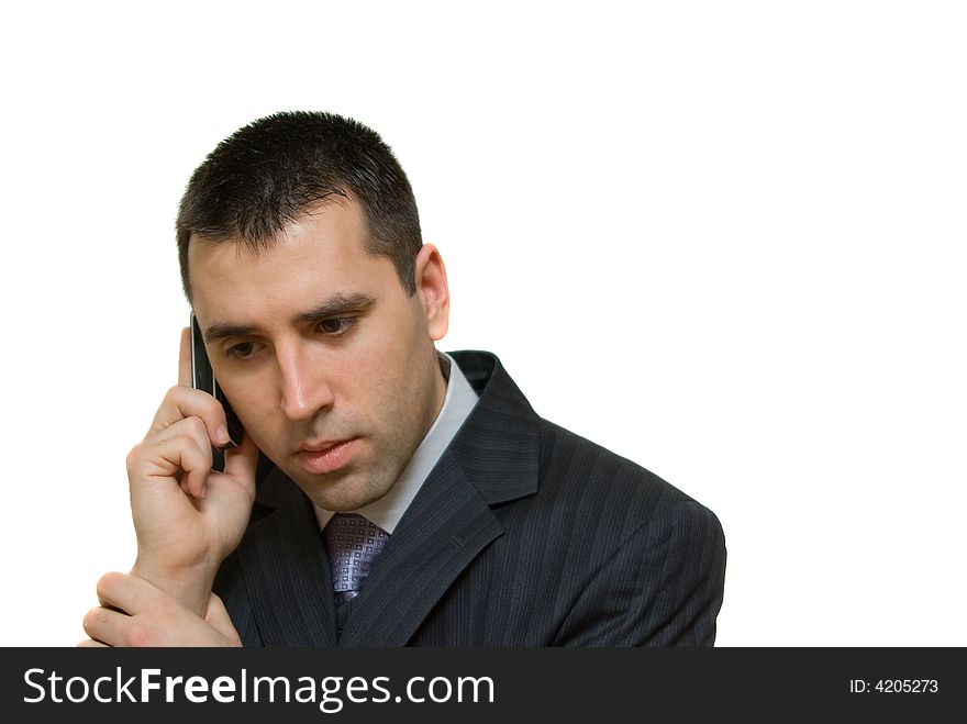 Young man talking on a phone, isolated on white background. Young man talking on a phone, isolated on white background